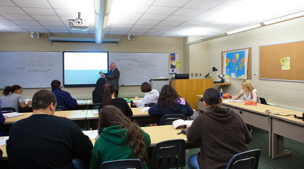 Students and professor conducting class